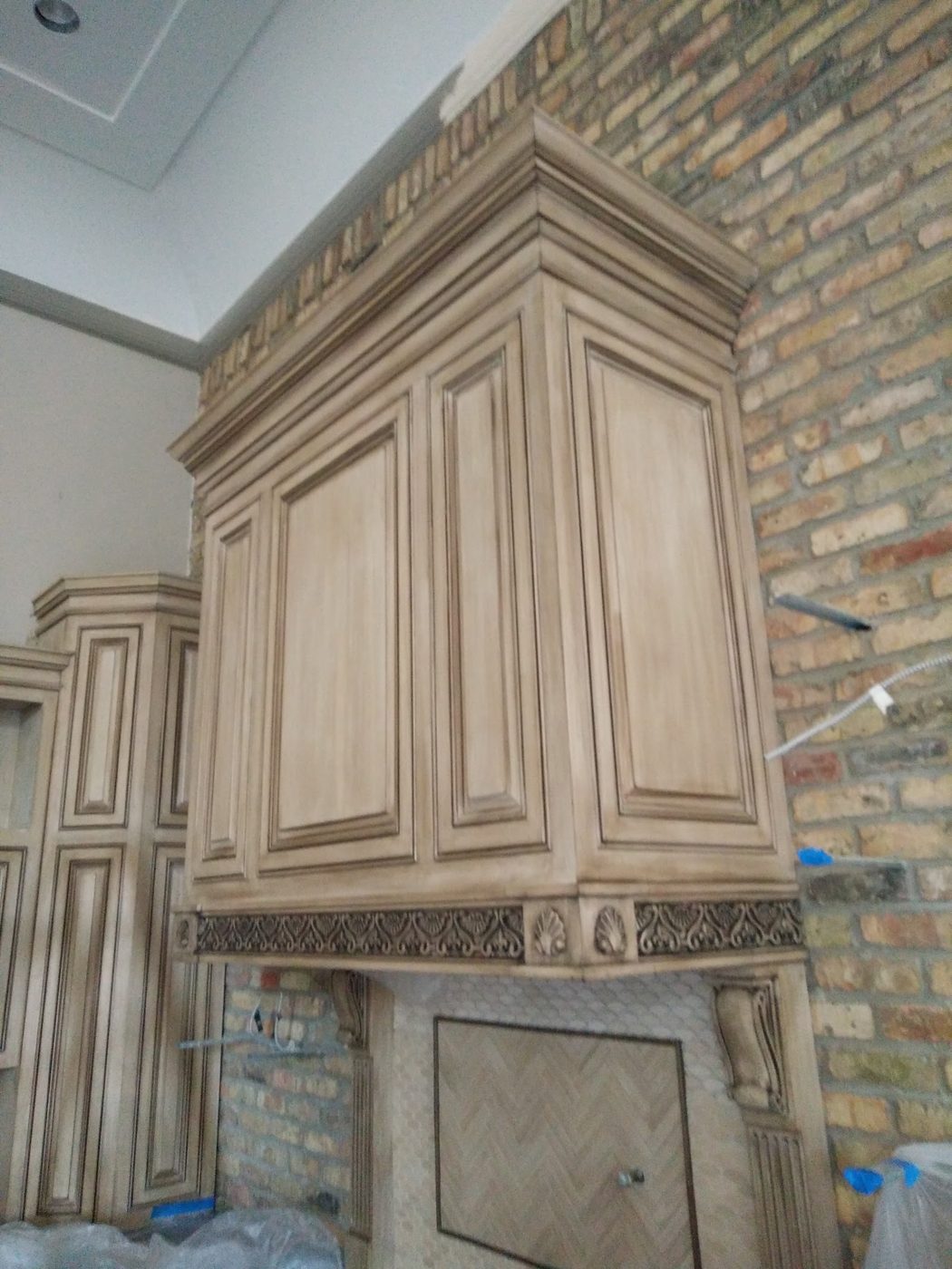 Glazed cabinet and hood detail