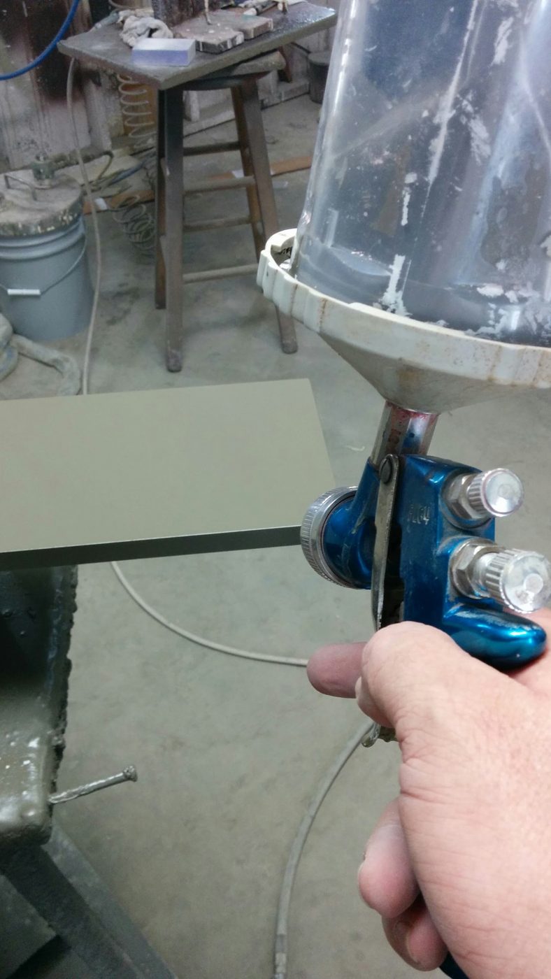 Spray finishing a cabinet door