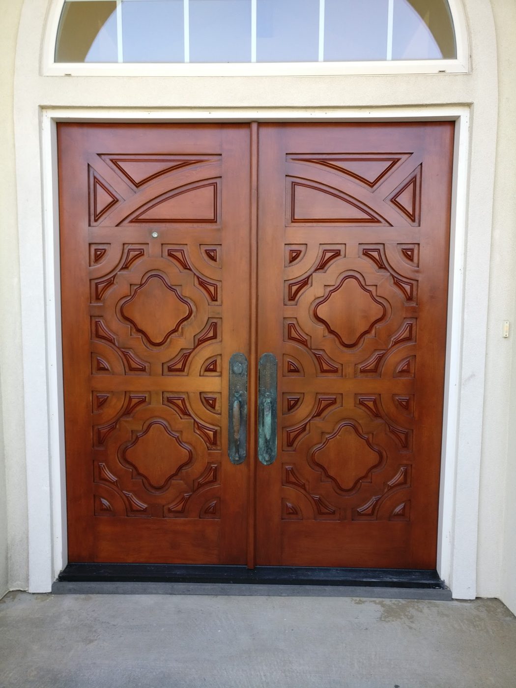 Stained and finished wood double doors